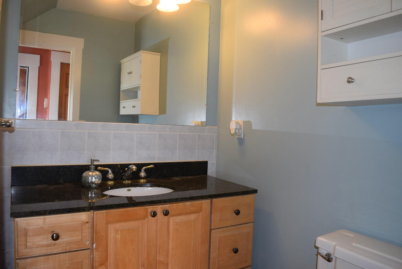 99 South Main Street Acushnet, MA 02743 - Photo 16 of 46 a close view of sink and mirror