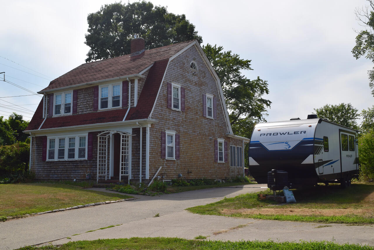 99 South Main Street Acushnet, MA 02743 - Photo 2 of 46 a view of a house with a yard