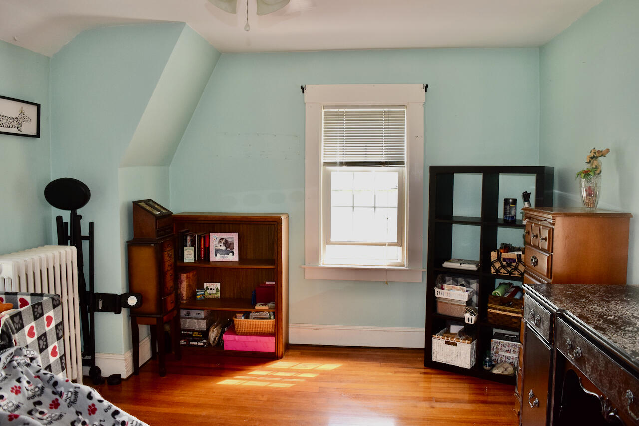 99 South Main Street Acushnet, MA 02743 - Photo 24 of 46 a living room with furniture and wooden floor