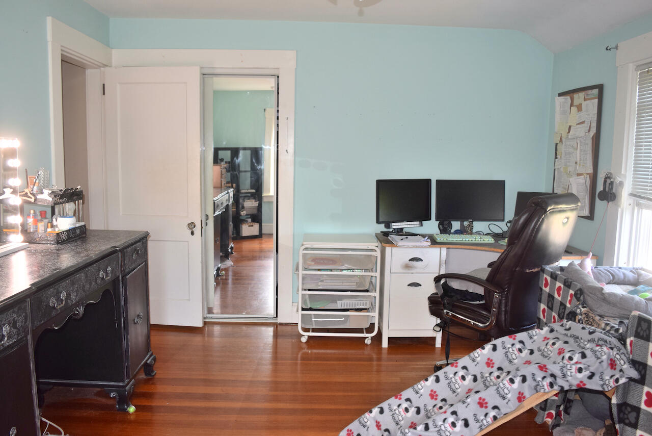 99 South Main Street Acushnet, MA 02743 - Photo 25 of 46 a view of workspace with wooden floor windows cabinet