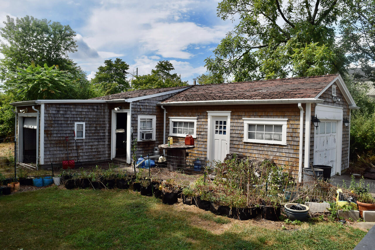 99 South Main Street Acushnet, MA 02743 - Photo 32 of 46 a house view with a garden space