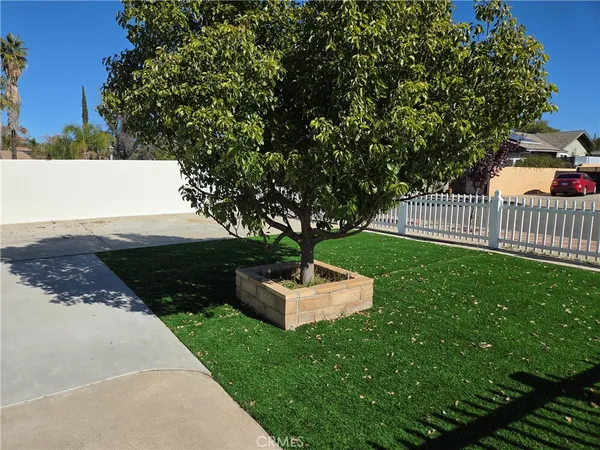 a garden view with a seating space