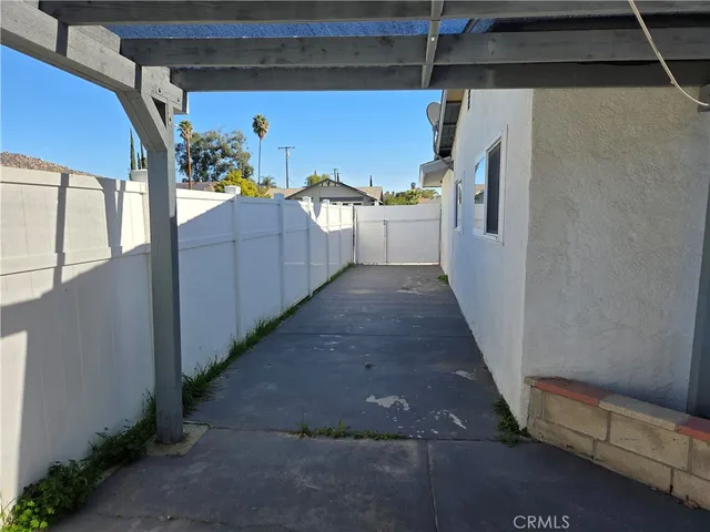 a view of balcony with furniture