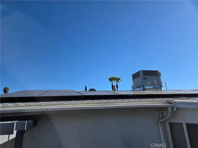 a view of a house with entryway and wooden floor