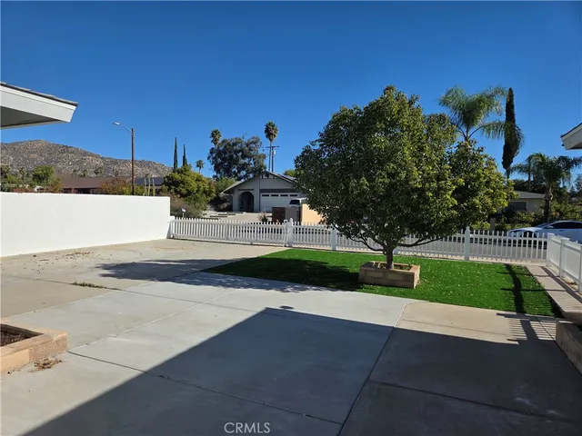 a view of a street with a houses