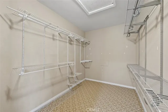 a view of a room with racks on the wall