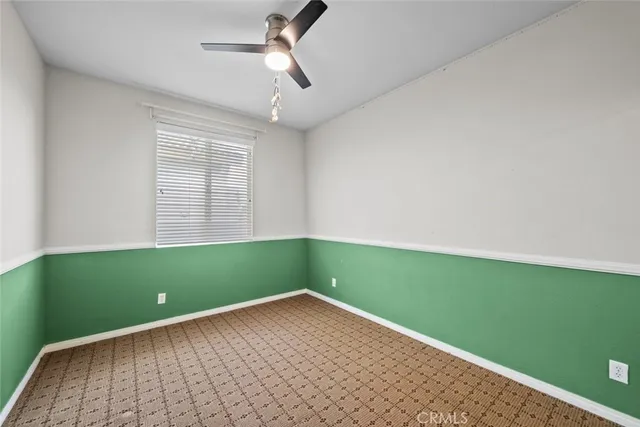 a view of a room with a large window