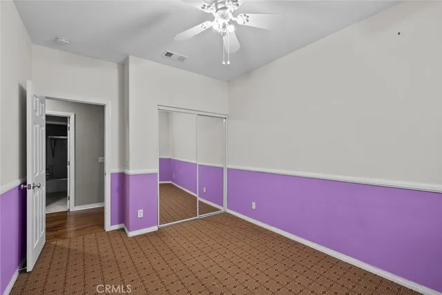 a bathroom with a shower a toilet and a sink