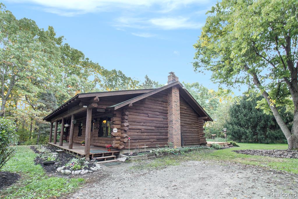 4166 Sweet Road Howell, MI 48843 - Photo 1 of 33