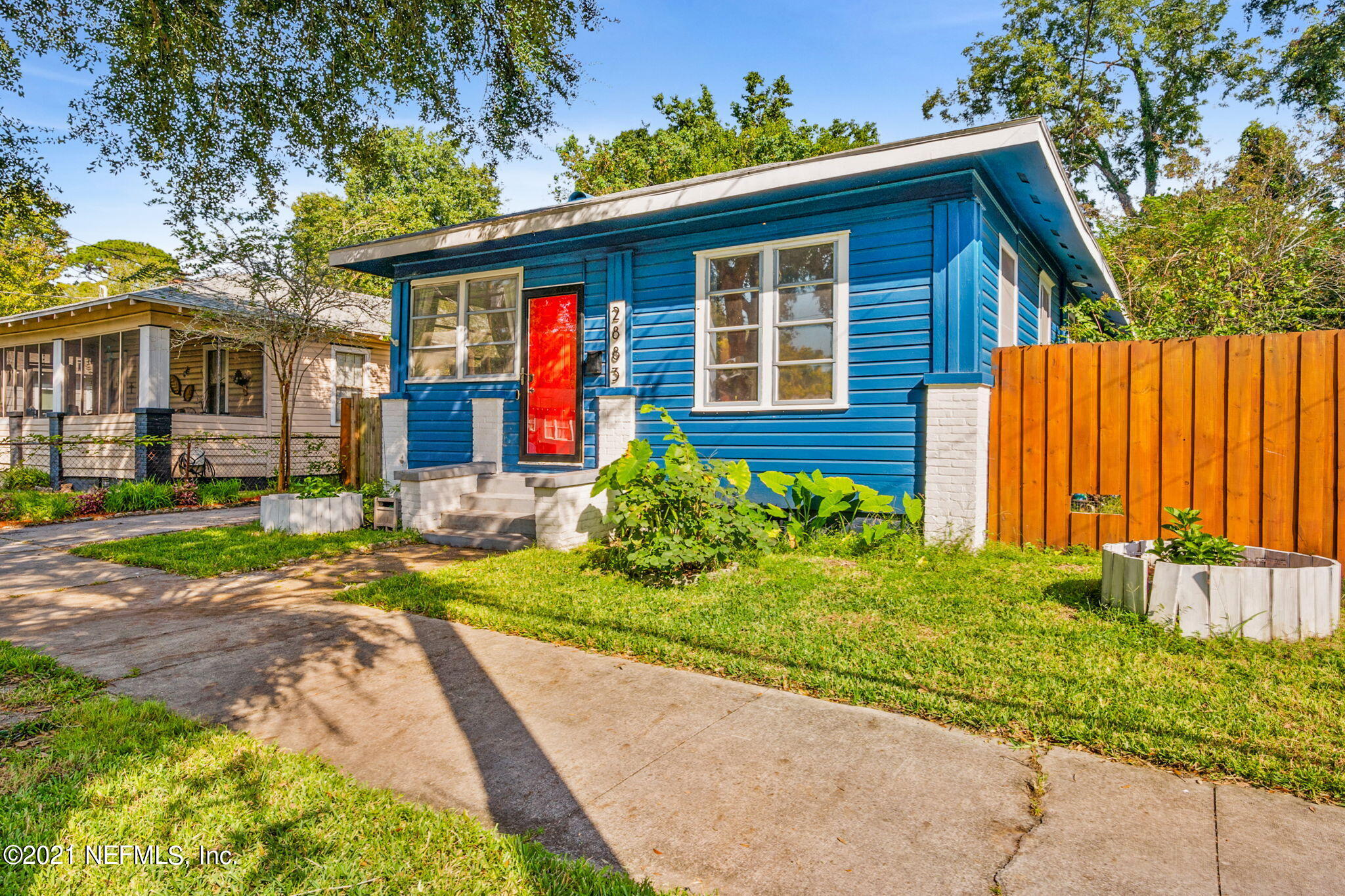 2883 Forbes Street Jacksonville, FL 32205 - Photo 1 of 30 a front view of a house with garden