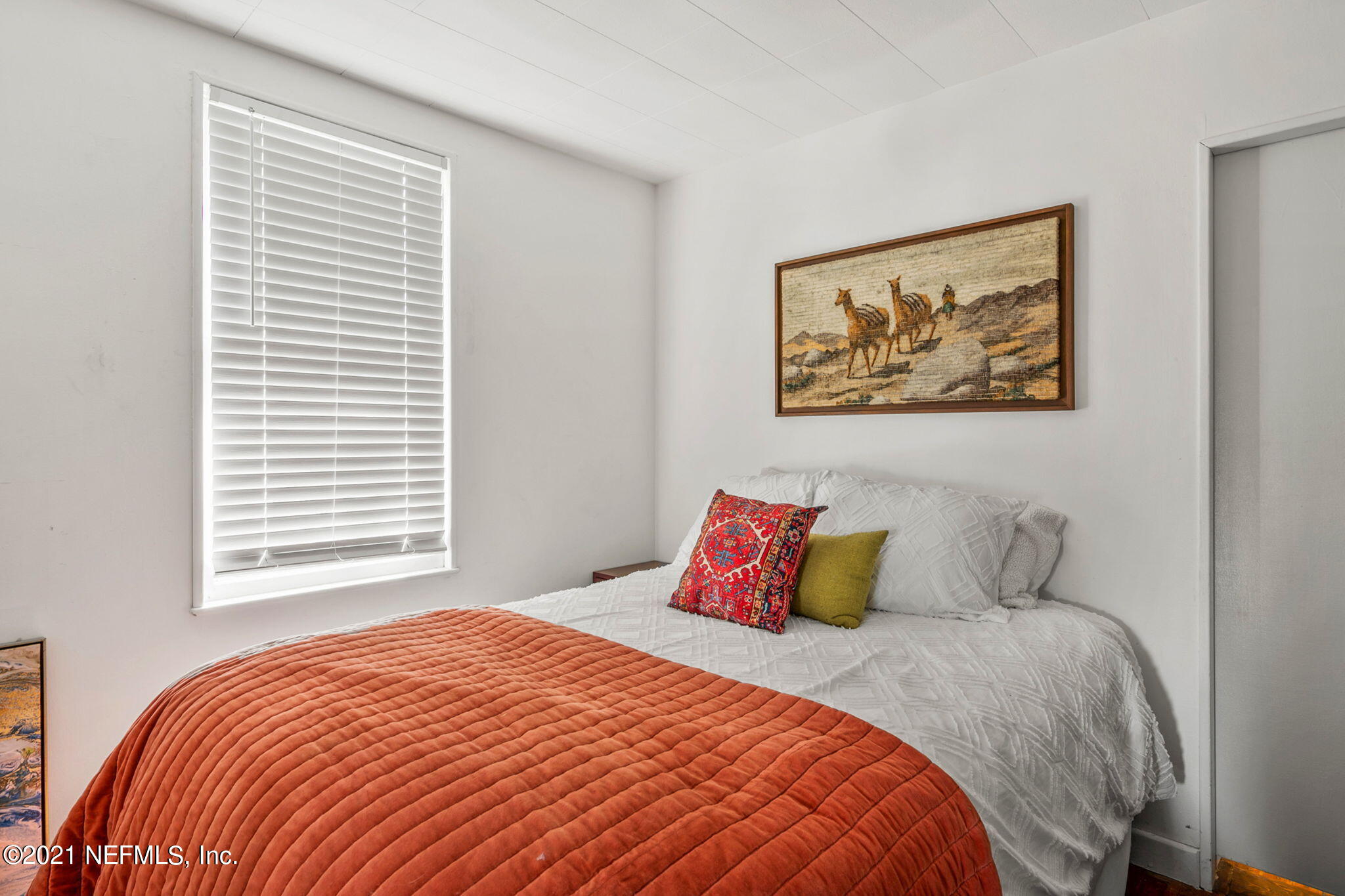 2883 Forbes Street Jacksonville, FL 32205 - Photo 20 of 30 a bedroom with a bed and a painting on the wall