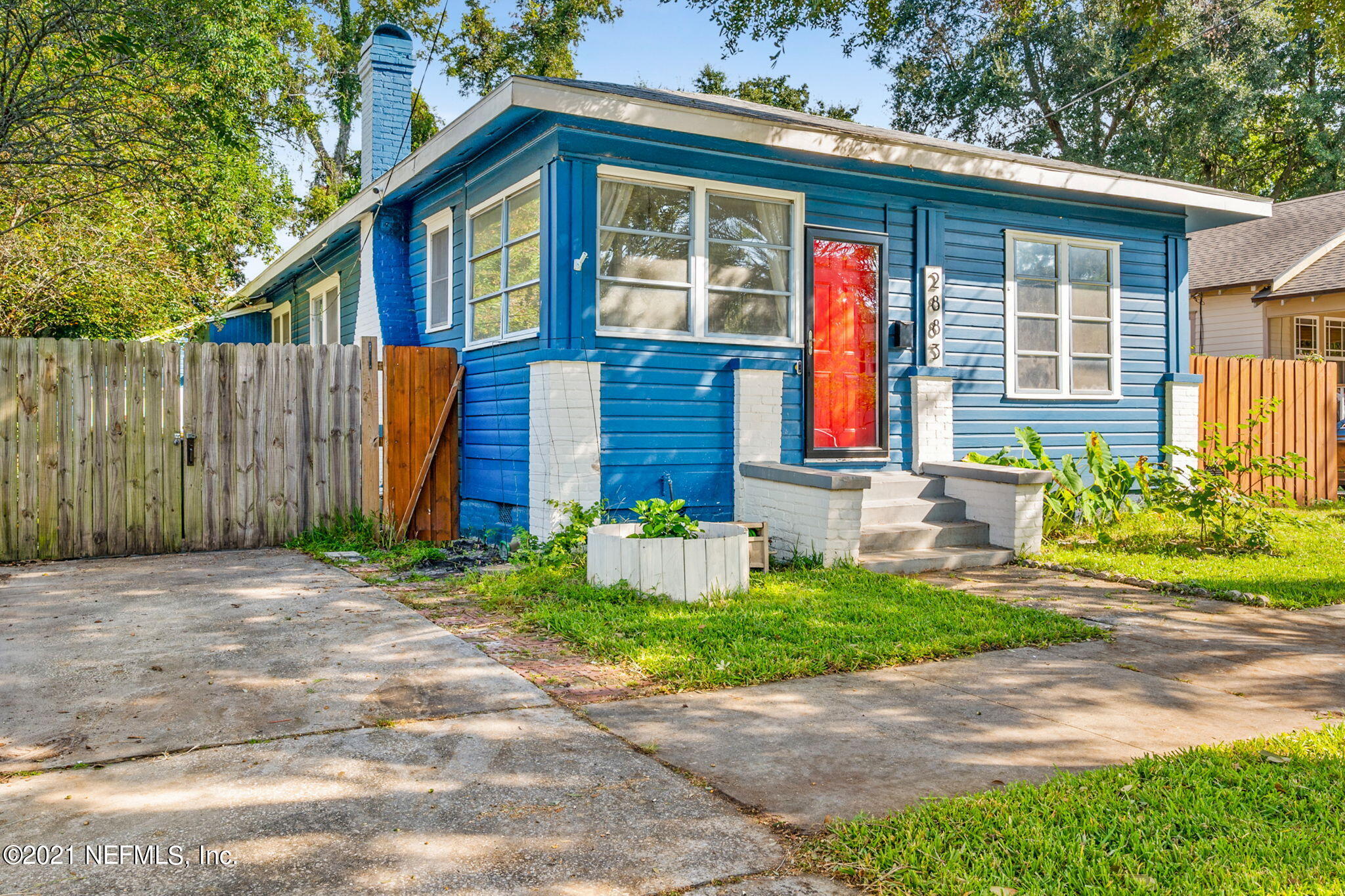 2883 Forbes Street Jacksonville, FL 32205 - Photo 2 of 30 a front view of a house with garden