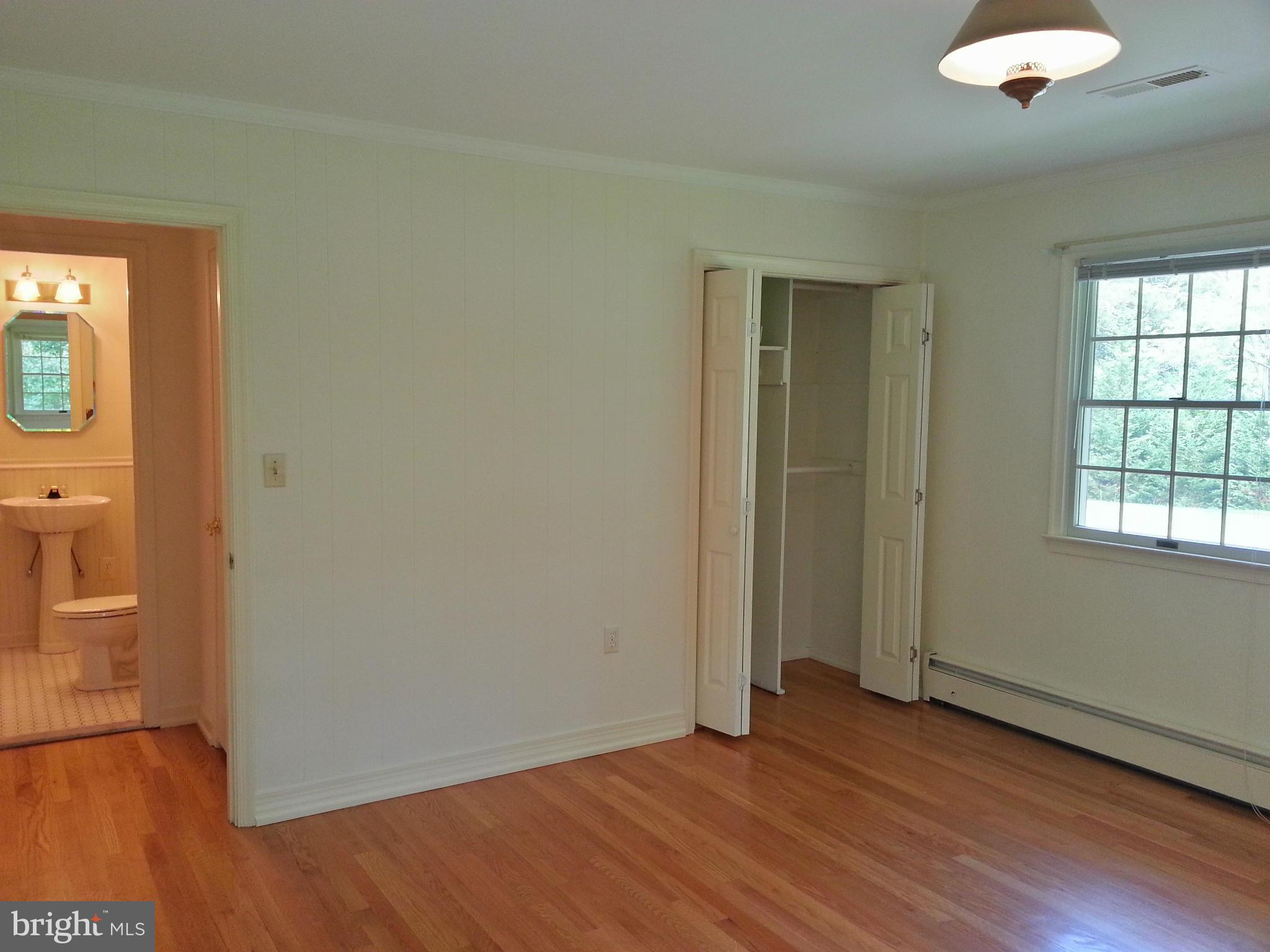 12825 Mccready Road Lusby, MD 20657 - Photo 15 of 28 Bedroom #2 to half bathroom