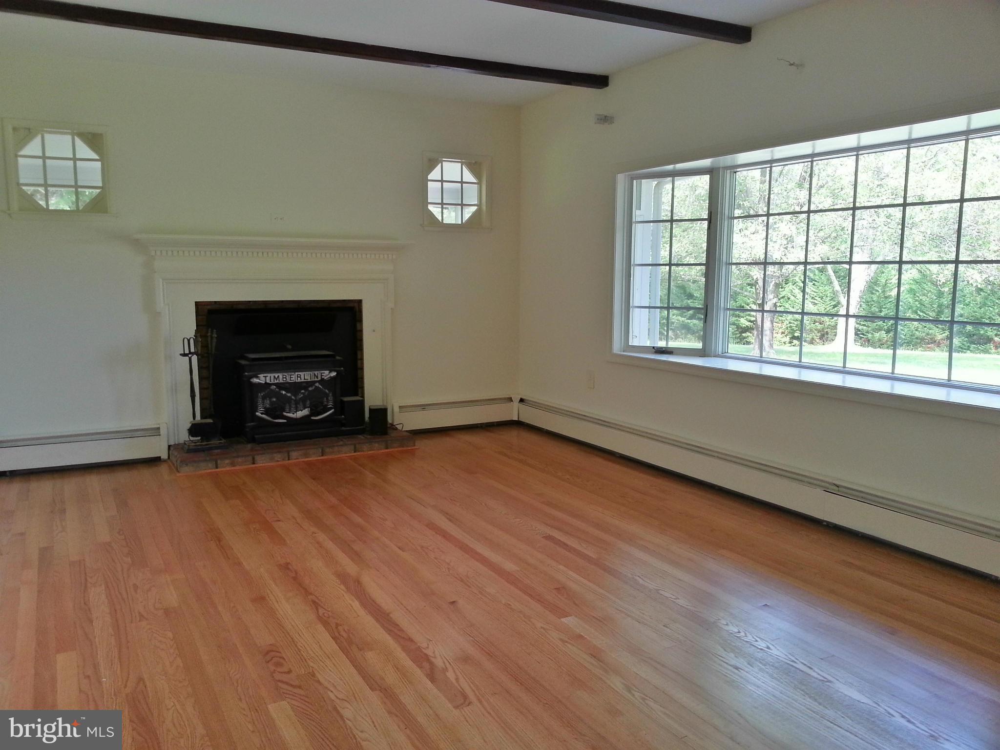 12825 Mccready Road Lusby, MD 20657 - Photo 20 of 28 Living Room to fireplace
