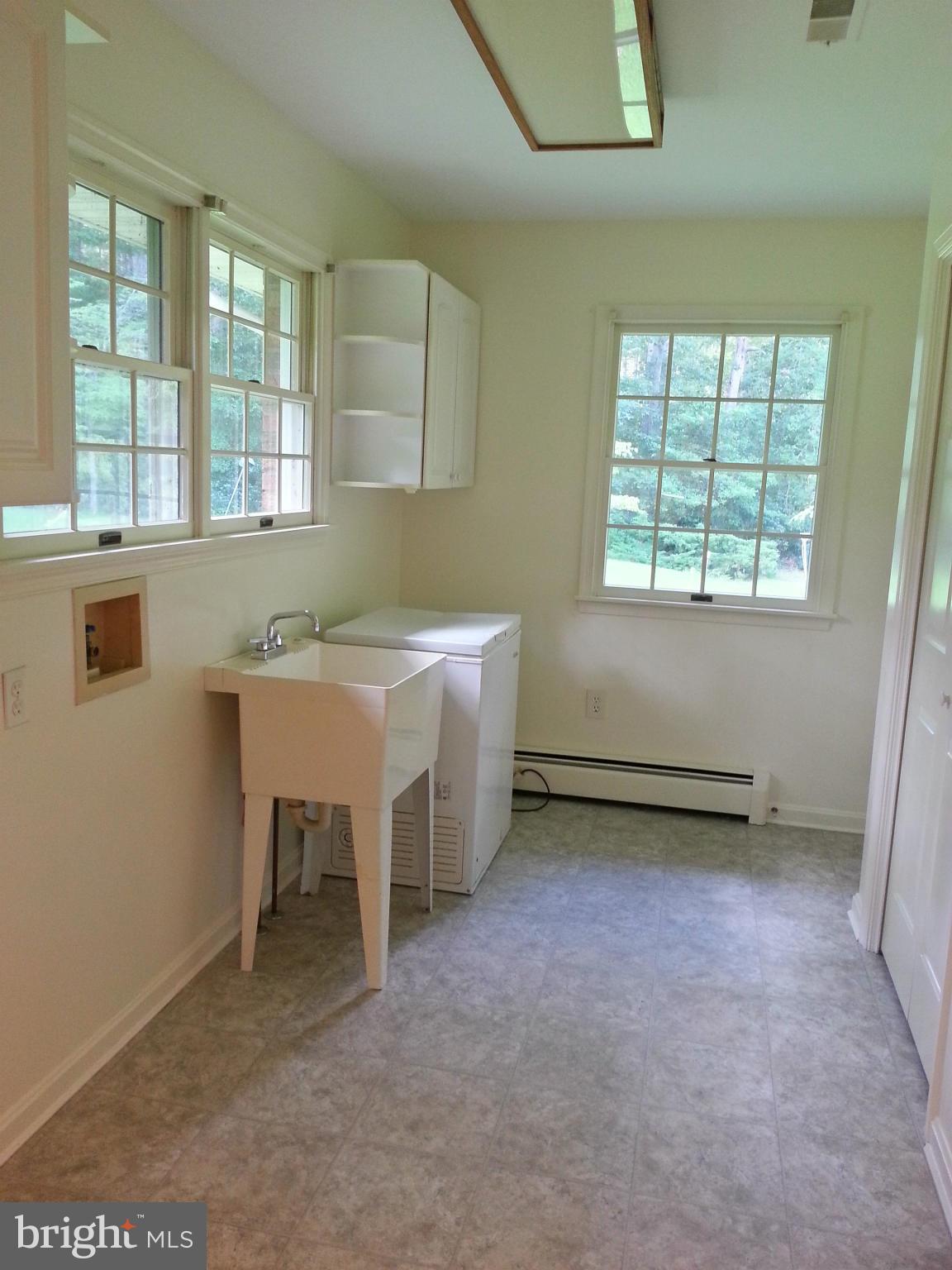 12825 Mccready Road Lusby, MD 20657 - Photo 23 of 28 Laundry Room