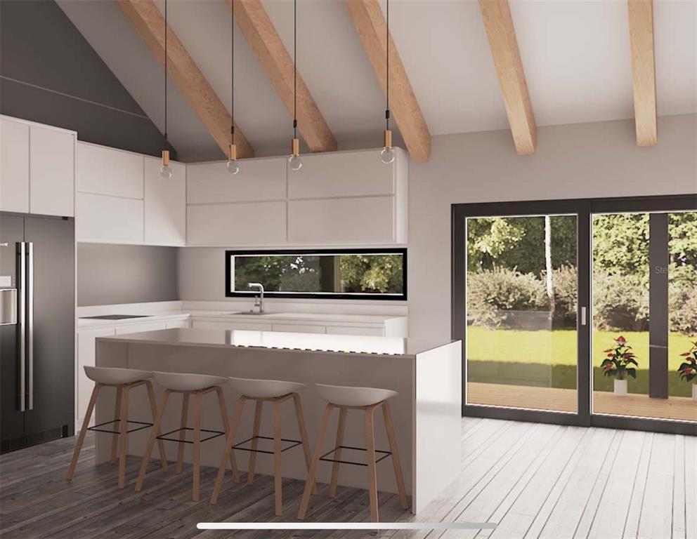 127 Longtree Street Georgetown, FL 32139 - Photo 8 of 11 a kitchen with a table and chairs