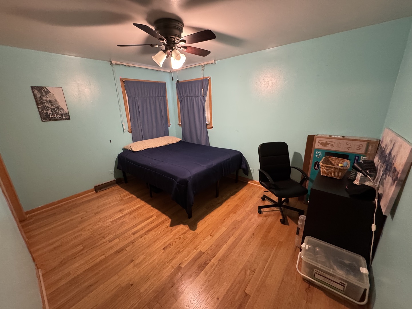 11117 South Ave L Chicago, IL 60617 - Photo 23 of 32 a bedroom with bed and a window