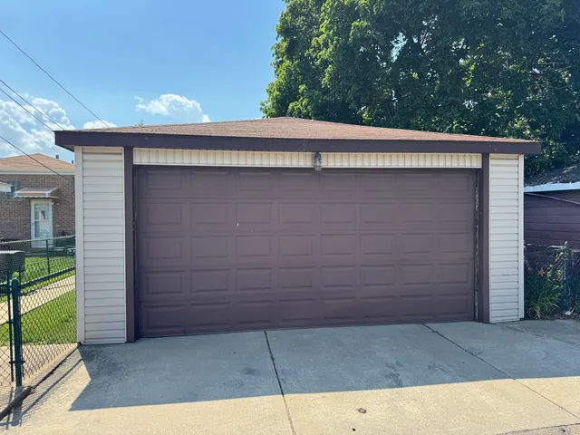 a view of backyard with cabin