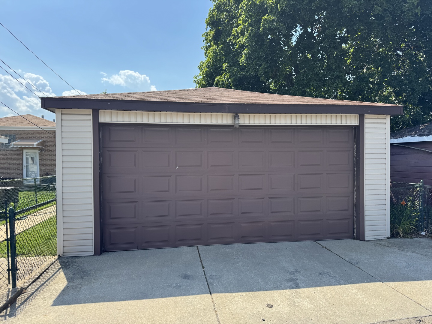 11117 South Ave L Chicago, IL 60617 - Photo 7 of 32 a view of backyard with cabin