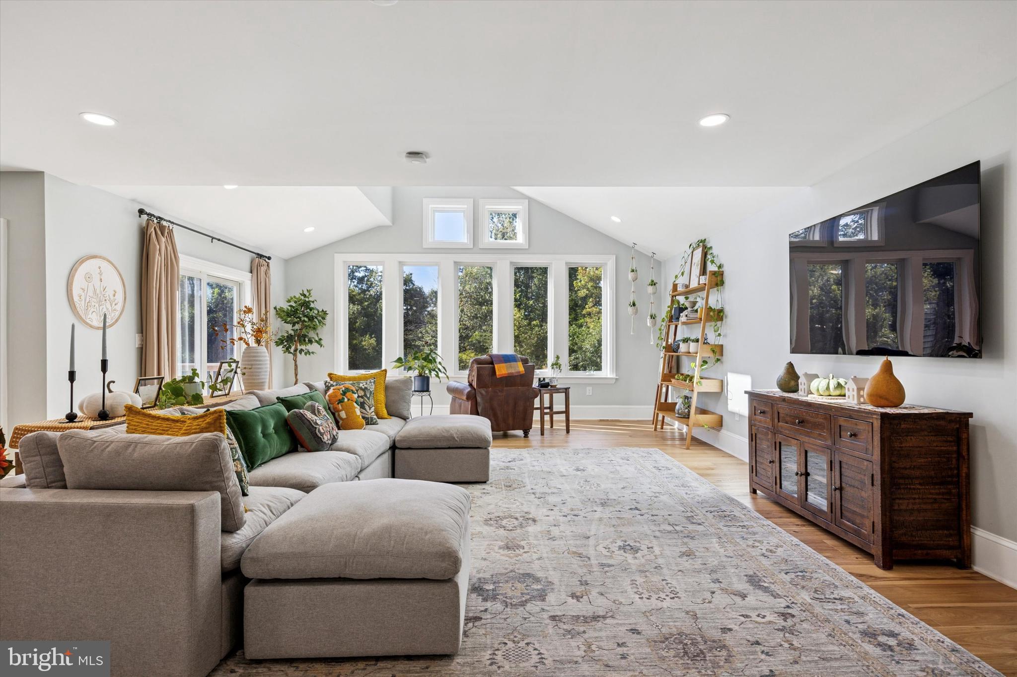 222 Windsor Way Doylestown, PA 18901 - Photo 11 of 42 a living room with furniture and a flat screen tv