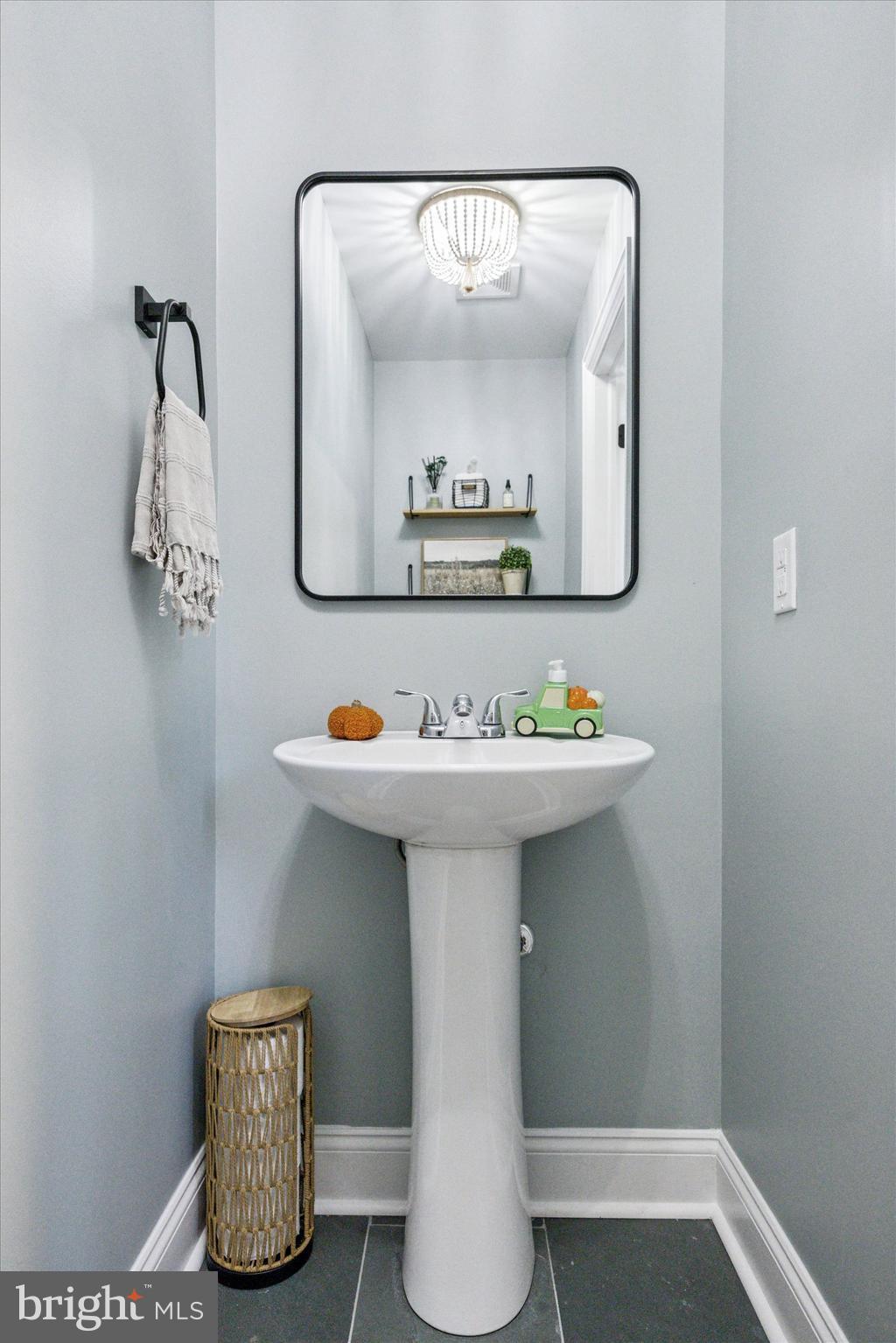 222 Windsor Way Doylestown, PA 18901 - Photo 14 of 42 a bathroom with a sink a mirror and vanity