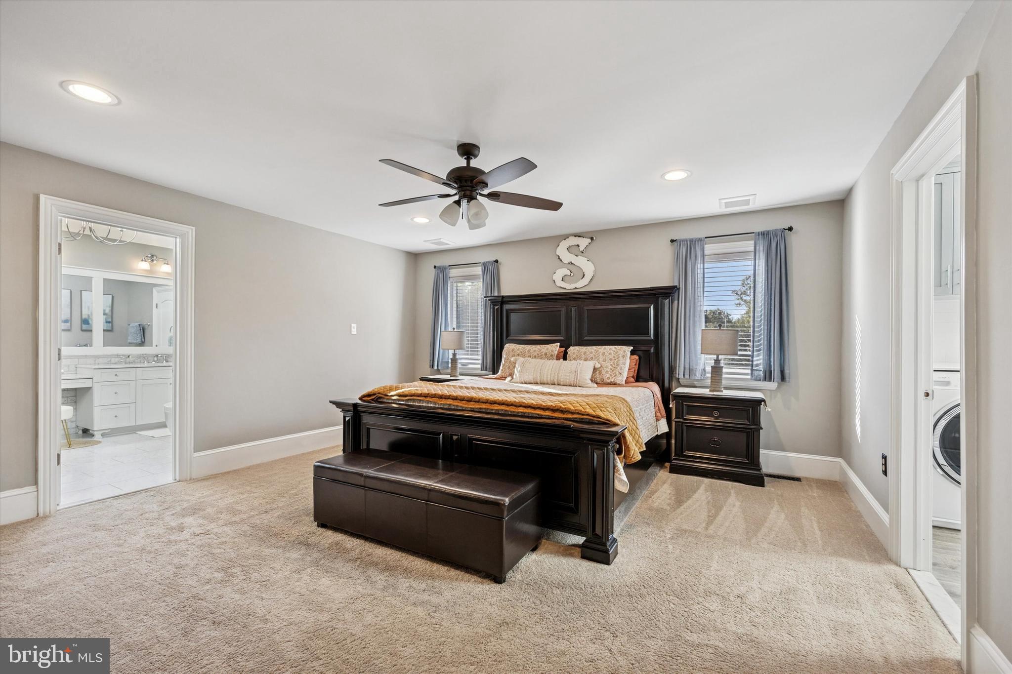 222 Windsor Way Doylestown, PA 18901 - Photo 15 of 42 a bed room with a bed and a chandelier