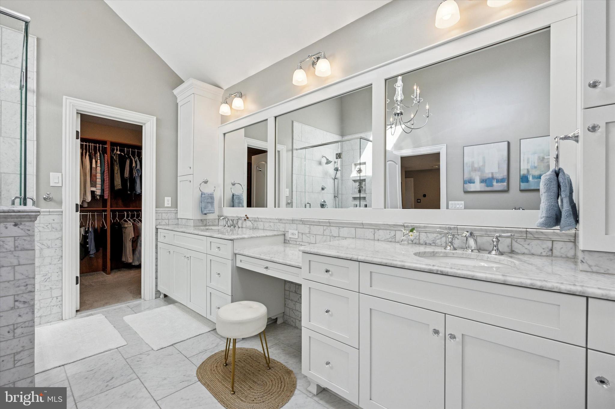 222 Windsor Way Doylestown, PA 18901 - Photo 18 of 42 a bathroom with a granite countertop sink a toilet and a mirror