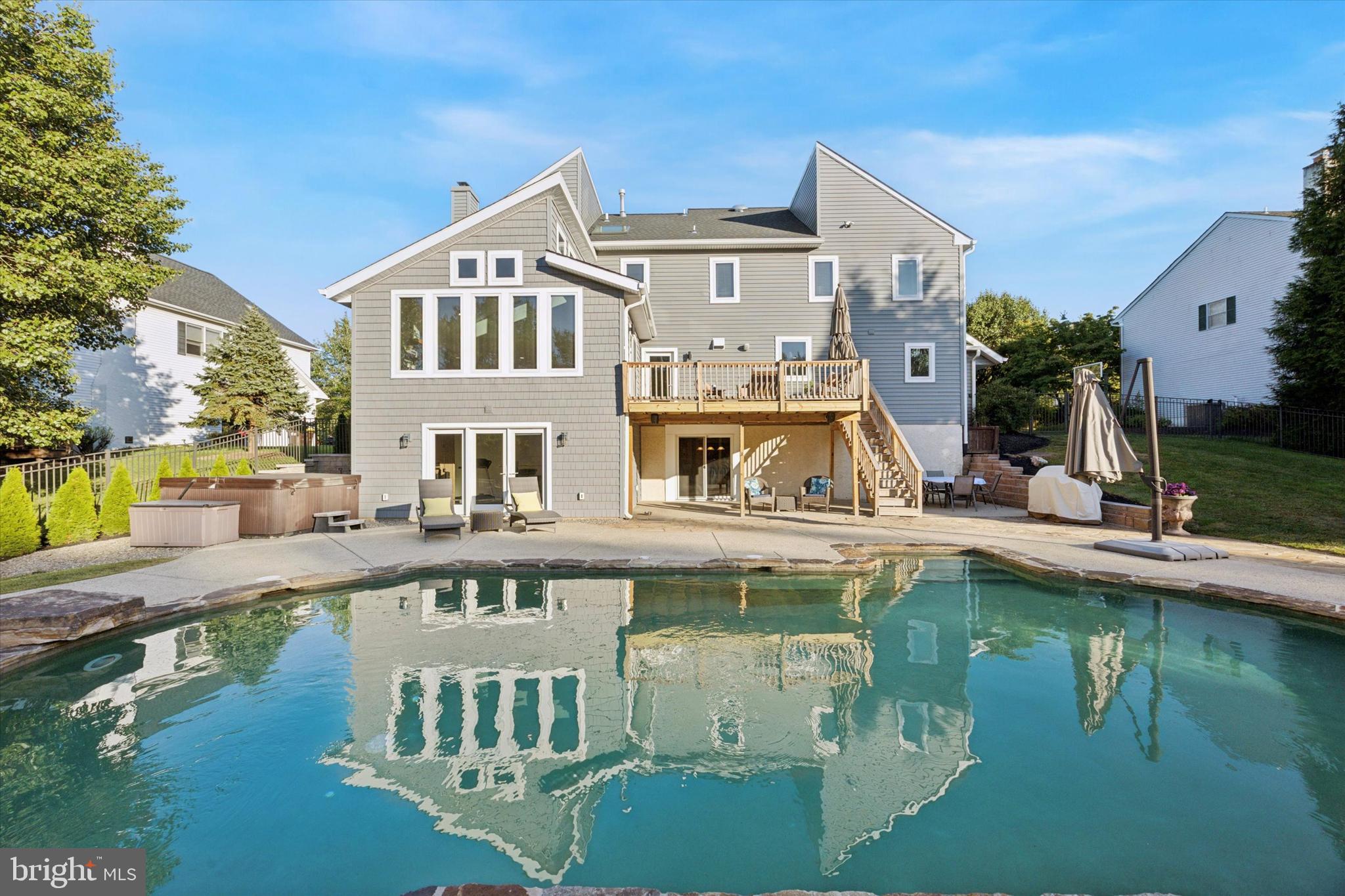 222 Windsor Way Doylestown, PA 18901 - Photo 2 of 42 a view of a house with pool and chairs