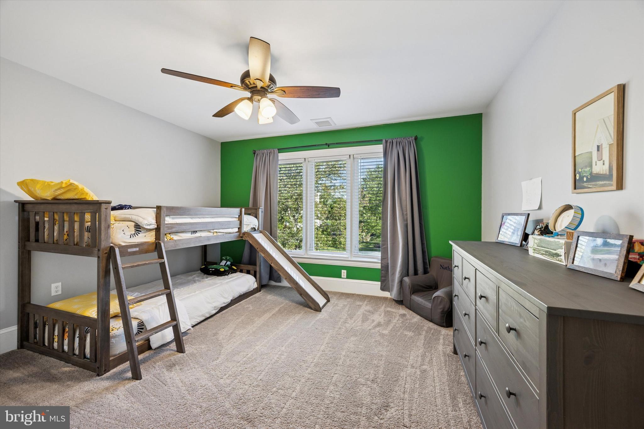 222 Windsor Way Doylestown, PA 18901 - Photo 22 of 42 a bedroom with a bed and a chandelier