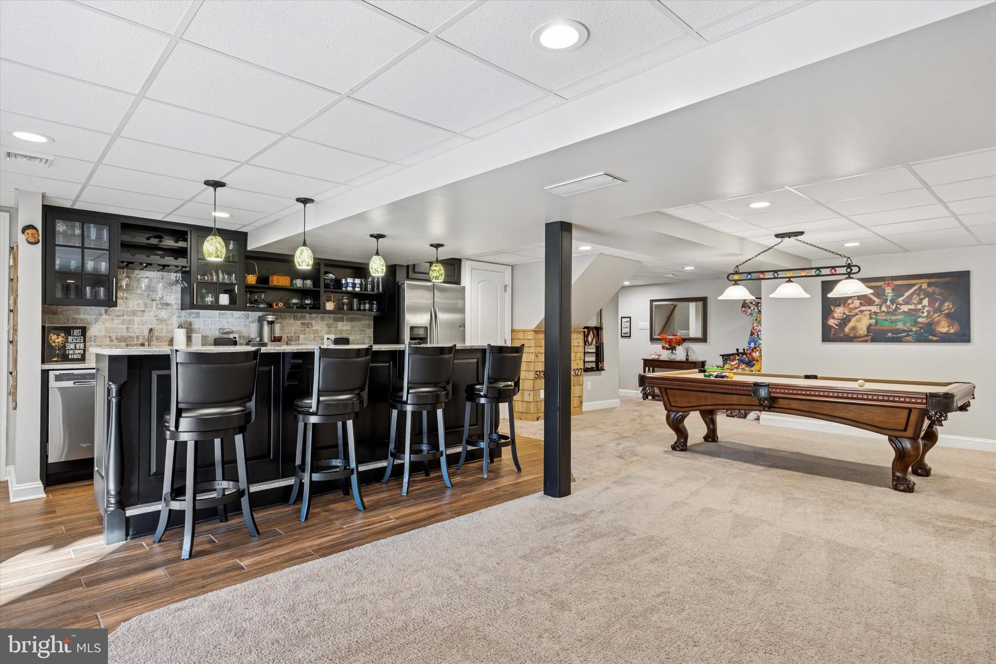 222 Windsor Way Doylestown, PA 18901 - Photo 28 of 42 a living room with lots of furniture and kitchen