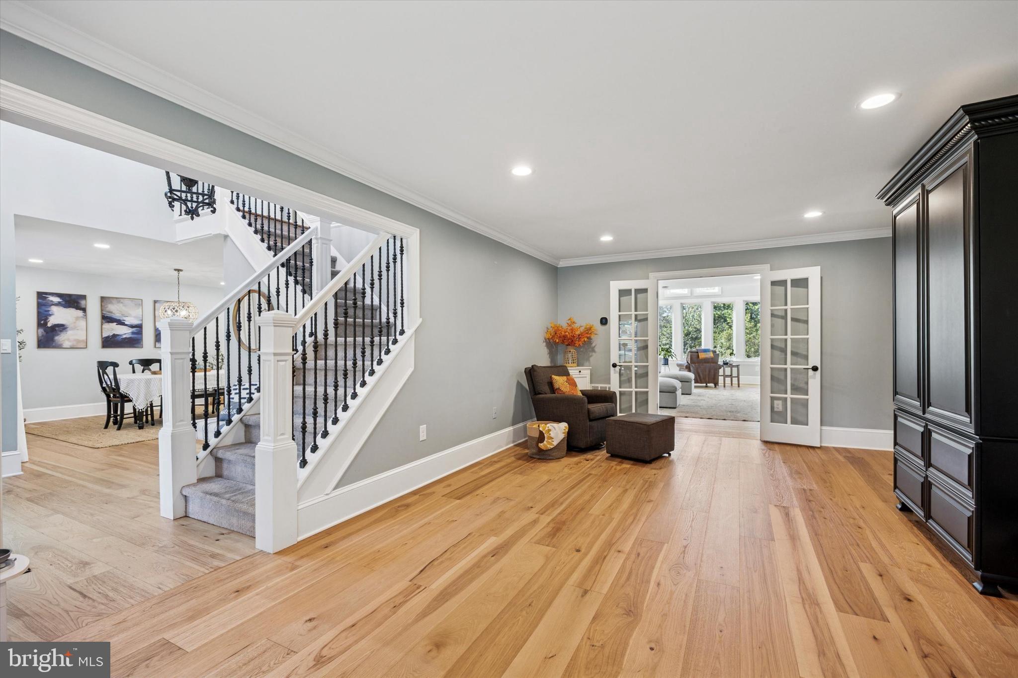 222 Windsor Way Doylestown, PA 18901 - Photo 3 of 42 a living room with furniture and a flat screen tv