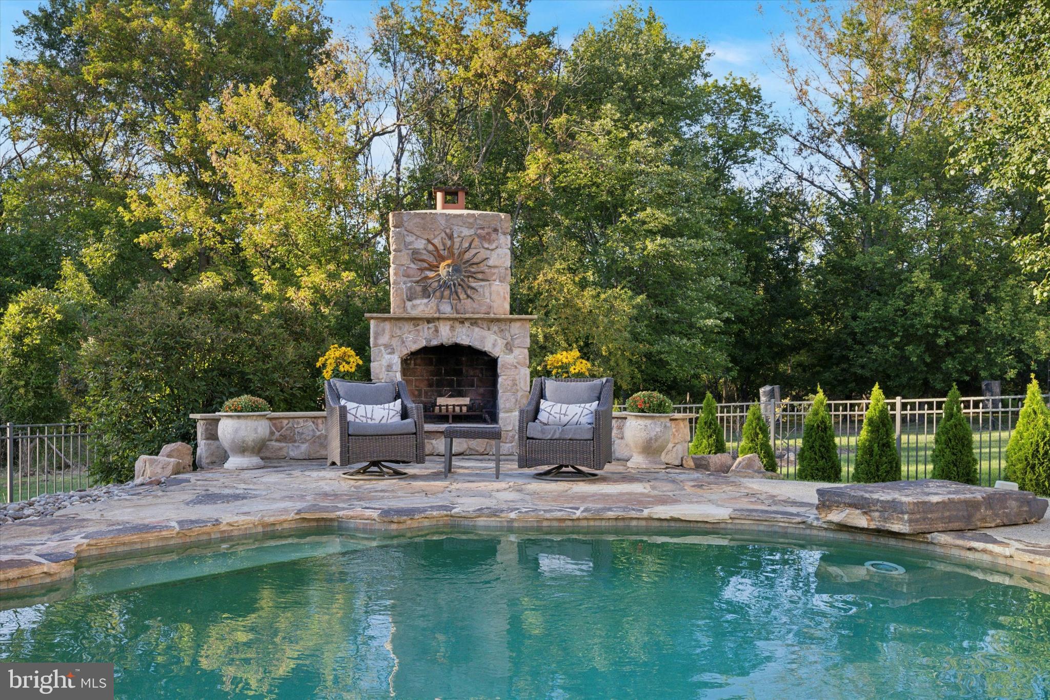 222 Windsor Way Doylestown, PA 18901 - Photo 37 of 42 a view of house with swimming pool and sitting area