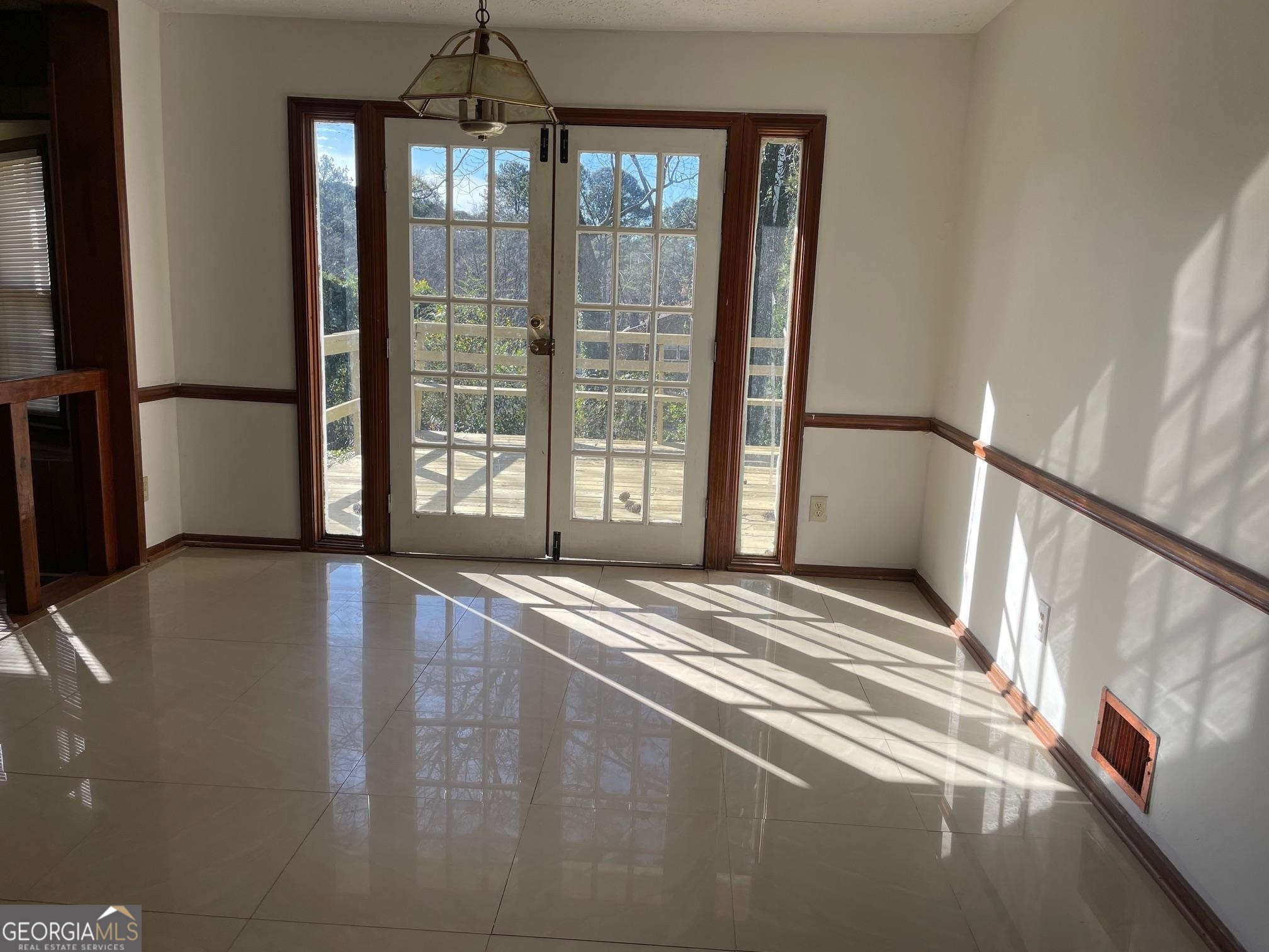4231 Rue Dartagnan Stone Mountain, GA 30083 - Photo 14 of 23 a view of an empty room with a window