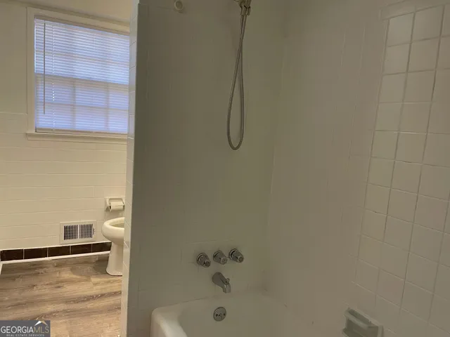 a bathroom with a bathtub