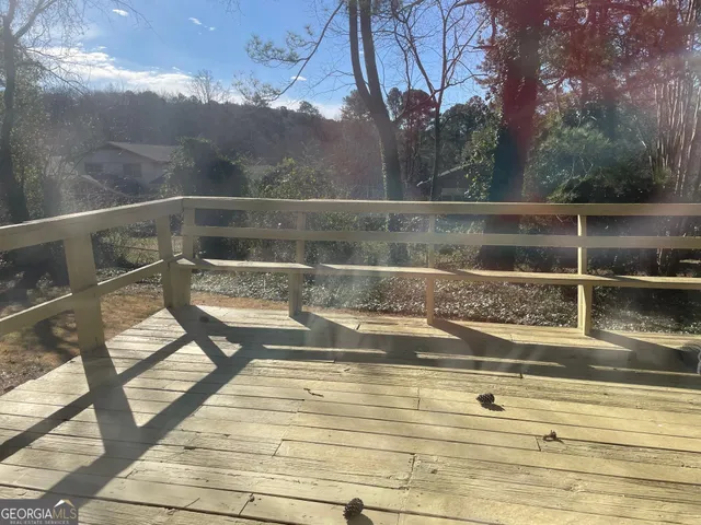 a view of swimming pool with a yard