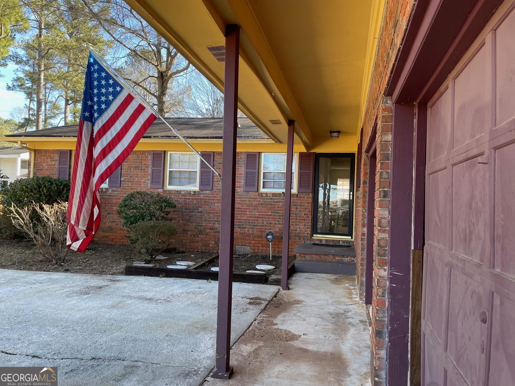4231 Rue Dartagnan Stone Mountain, GA 30083 - Photo 3 of 23 a view of outdoor space and porch
