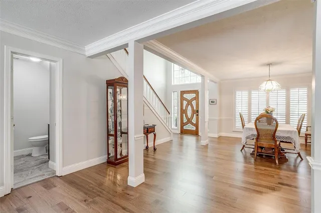 a bedroom with furniture and a fireplace