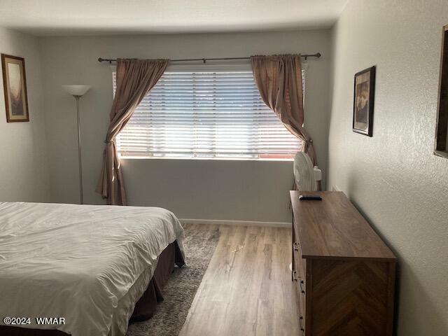 2670 Snow Slope Way Pinetop, AZ 85935 - Photo 17 of 18 a view of balcony with wooden floor