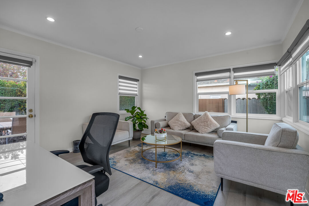 535 Winslow Avenue Long Beach, CA 90814 - Photo 12 of 32 a living room with furniture and a large window