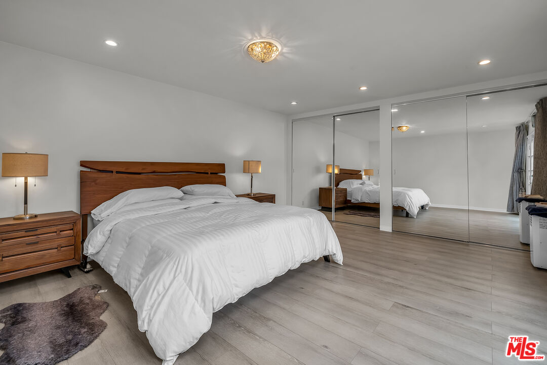 535 Winslow Avenue Long Beach, CA 90814 - Photo 16 of 32 a bed room with bed and a night stand