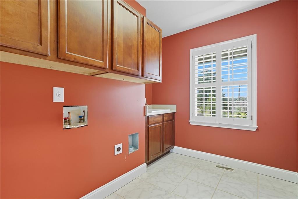 2347 Univeter Road Canton, GA 30115 - Photo 23 of 46 a view of an empty room with a window