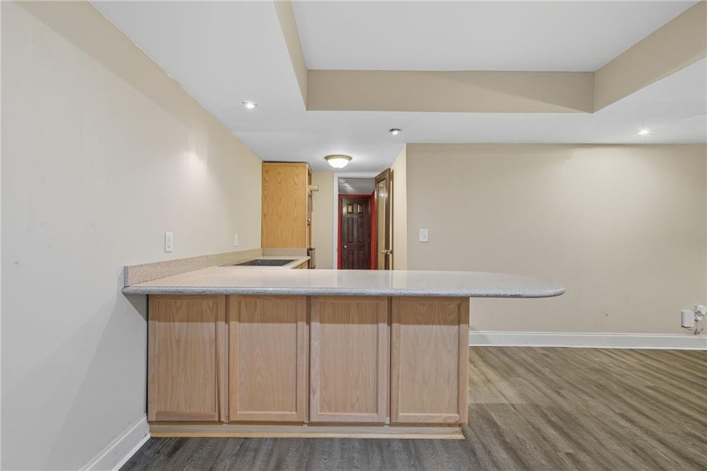 2347 Univeter Road Canton, GA 30115 - Photo 33 of 46 a room with wooden floor