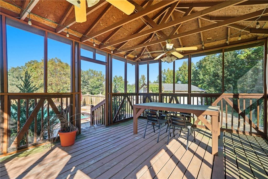 2347 Univeter Road Canton, GA 30115 - Photo 36 of 46 a view of a balcony with chairs and wooden floor