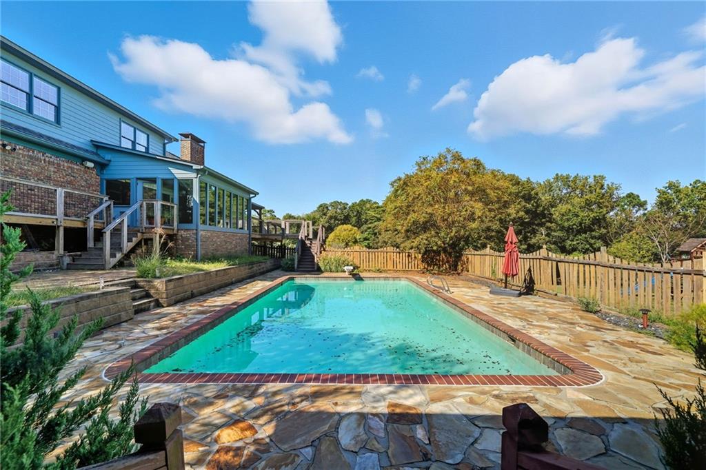 2347 Univeter Road Canton, GA 30115 - Photo 38 of 46 a view of a house with backyard