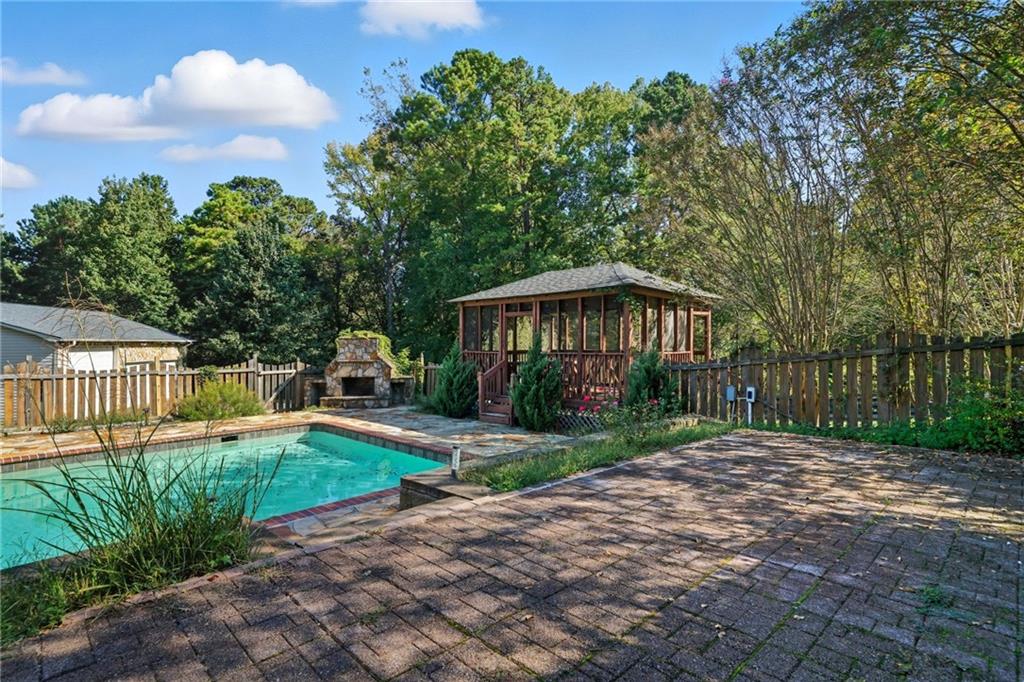 2347 Univeter Road Canton, GA 30115 - Photo 39 of 46 a view of a house with a yard