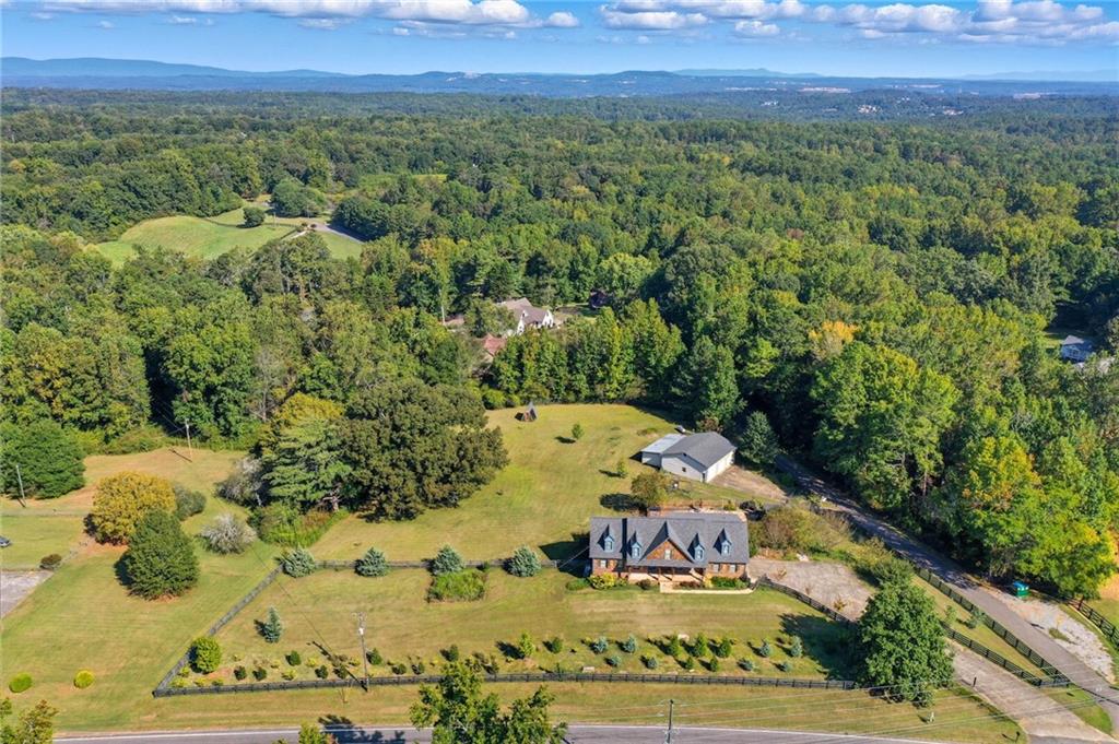 2347 Univeter Road Canton, GA 30115 - Photo 40 of 46 a view of a swimming pool with a yard