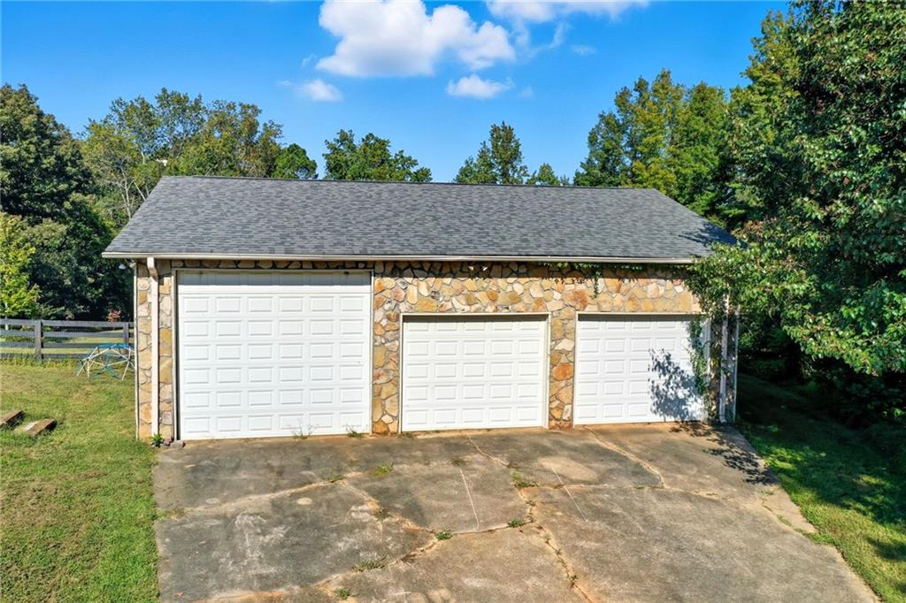 2347 Univeter Road Canton, GA 30115 - Photo 41 of 46 a view of house with backyard and garden