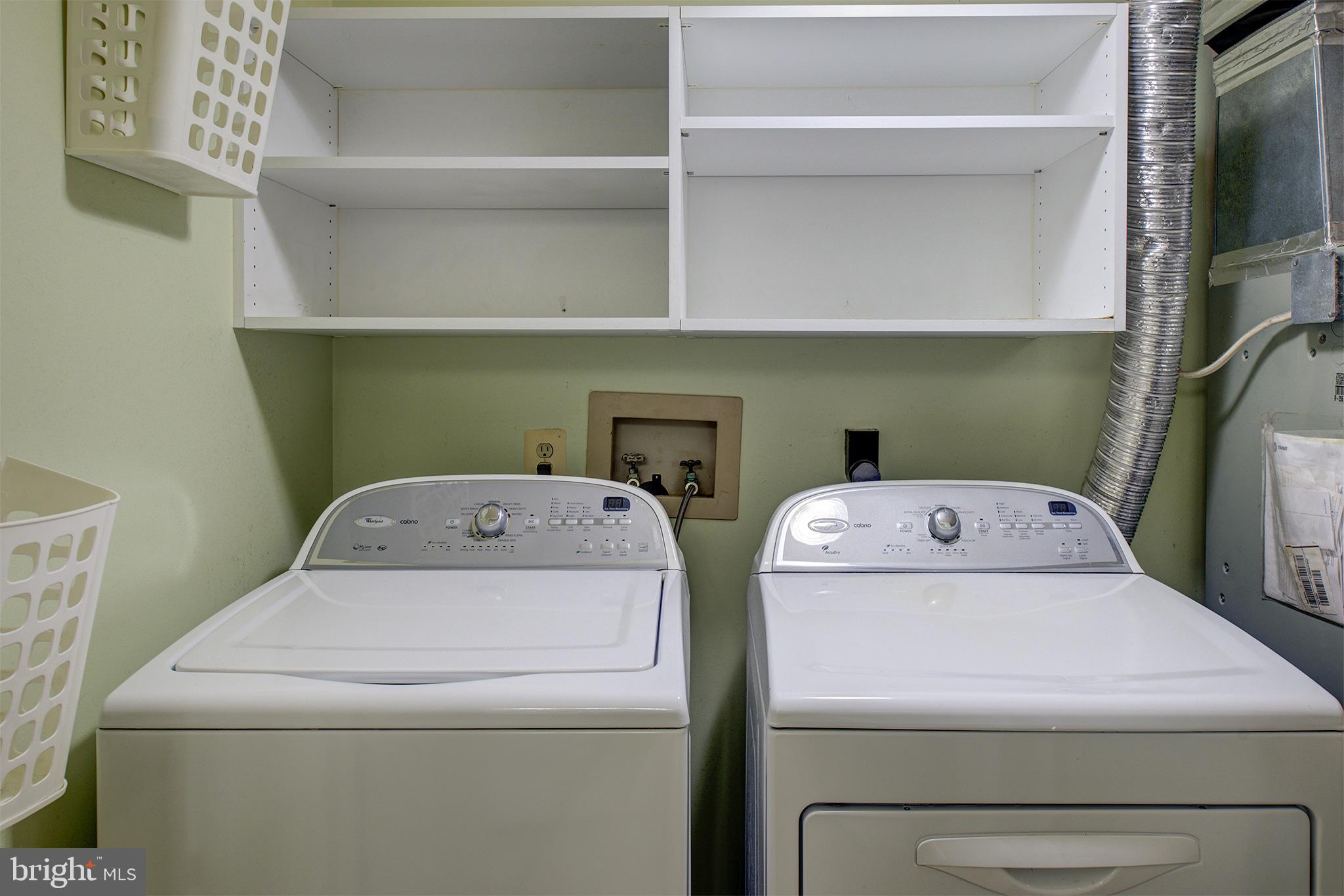 129 Fort Evans Road Southeast, Unit D Leesburg, VA 20175 - Photo 10 of 17 Separate laundry off primary bathroom