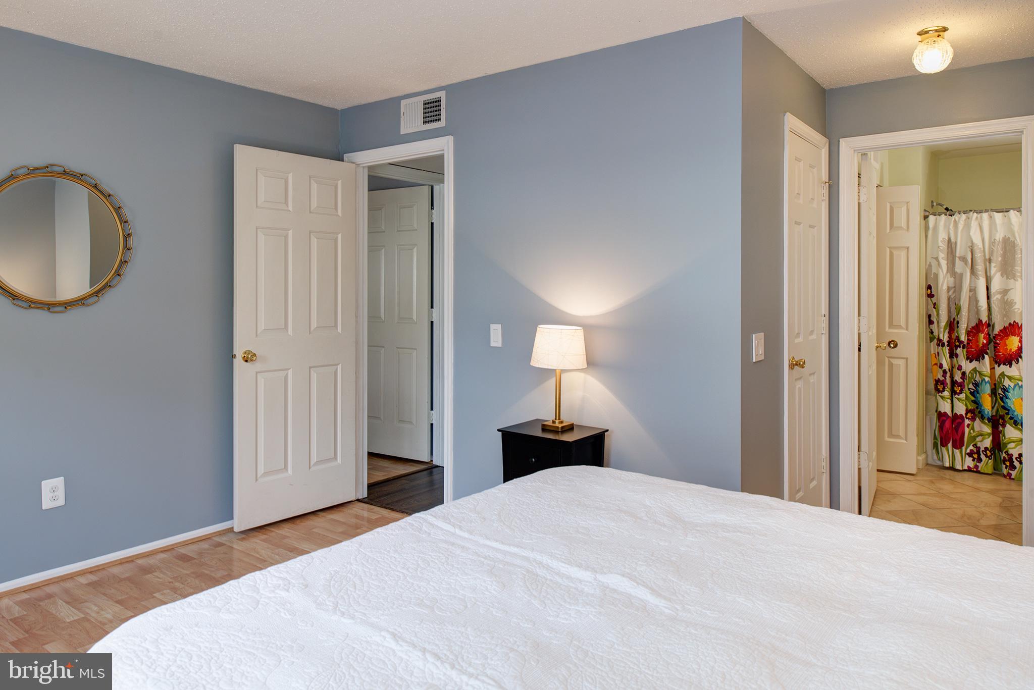 129 Fort Evans Road Southeast, Unit D Leesburg, VA 20175 - Photo 8 of 17 Primary bedroom with en-suite full bath