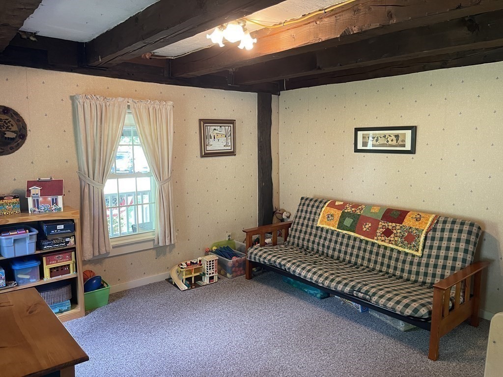 95 West Gill Road Gill, MA 01354 - Photo 11 of 40 a view of a room with toys and a window
